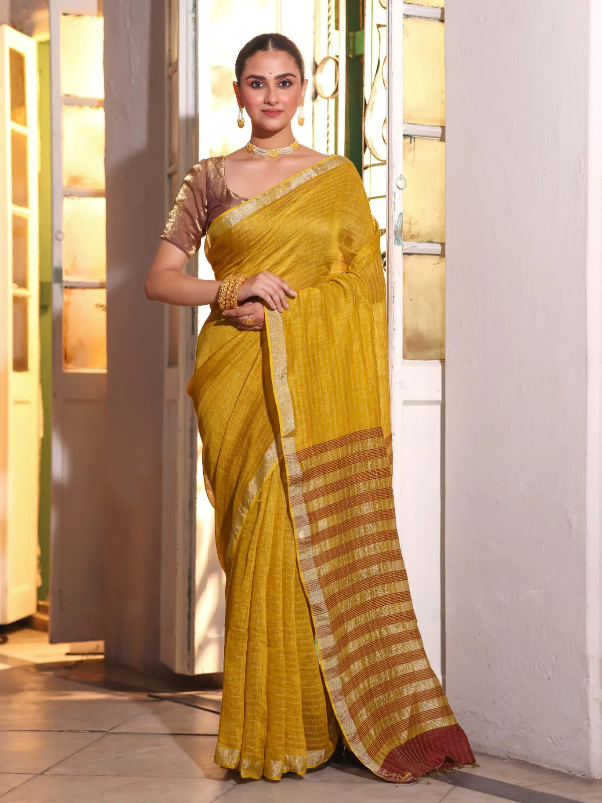 Saraswita Handwoven Linen Zari Saree Golden Sunrise