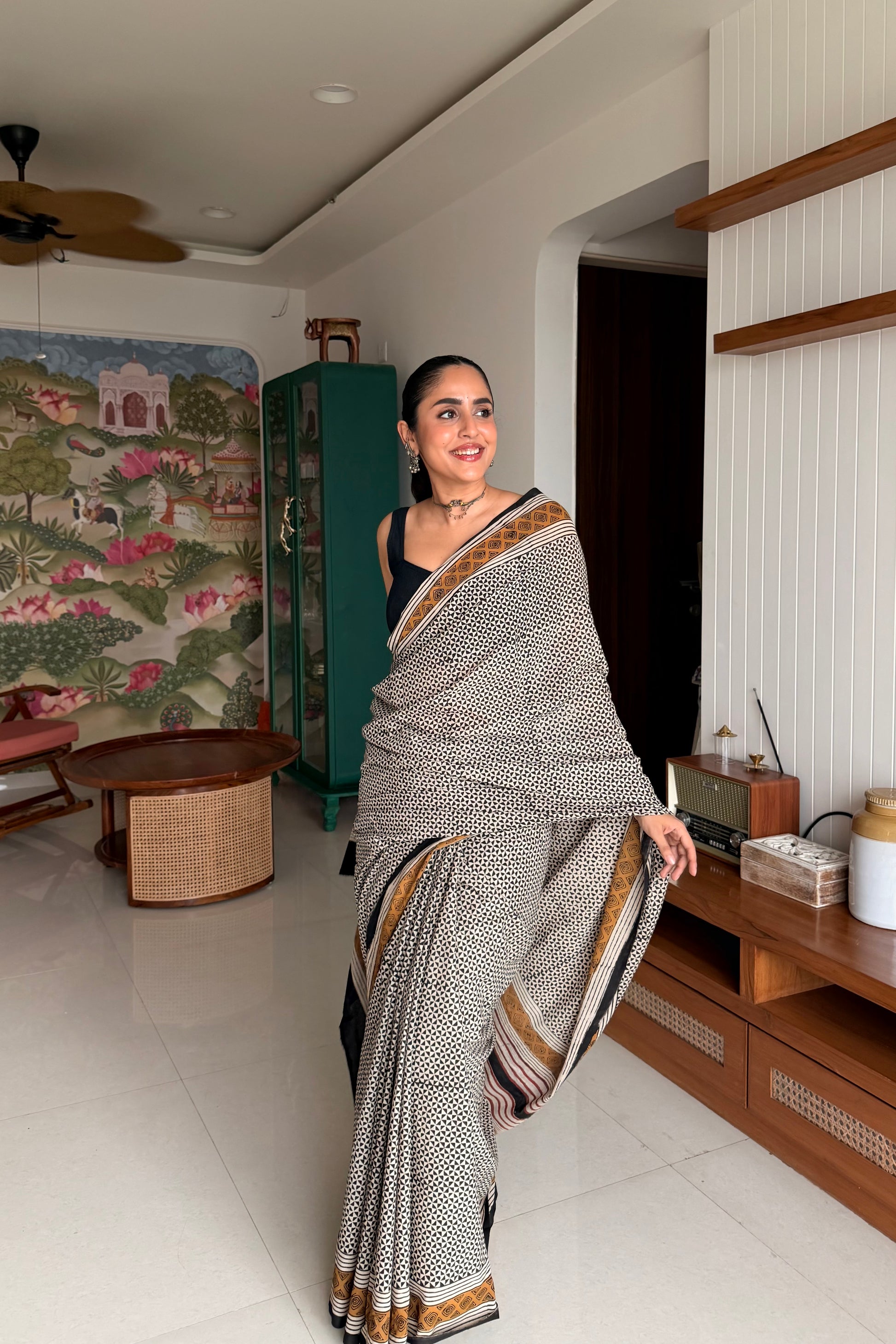 Chic and lightweight cotton daily wear saree styled with contemporary silver oxidised jewelry