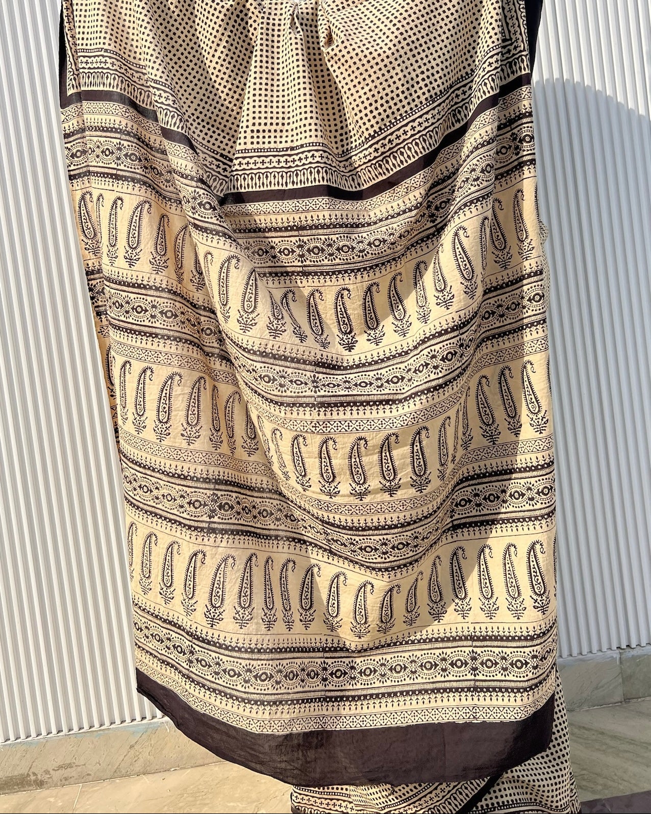 Styling inspiration for traditional Bagru cotton saree showing contrast printed pallu layout