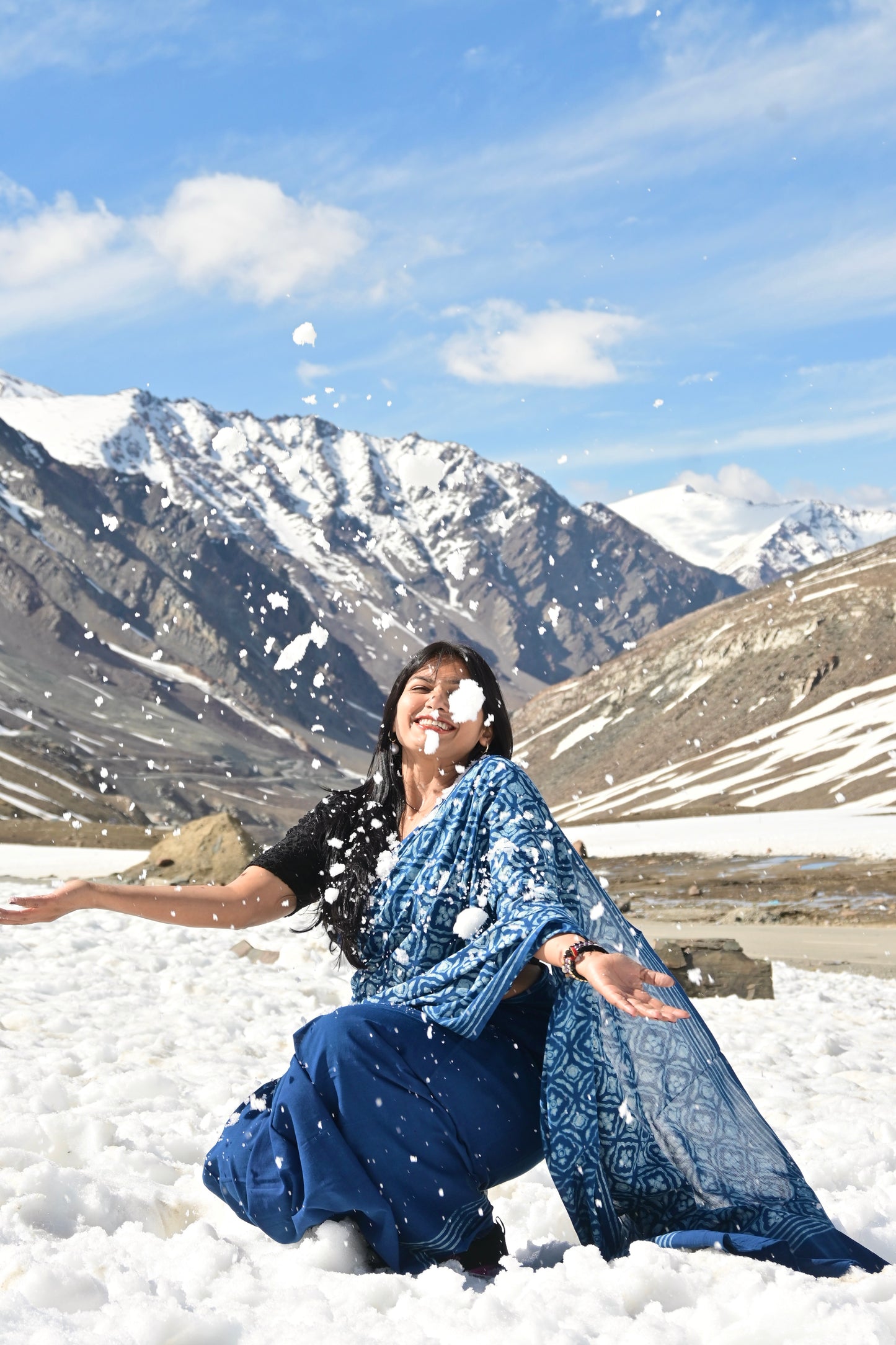 Model draping a Vasaka Jaipur Naina indigo cotton saree featuring traditional hand block prints