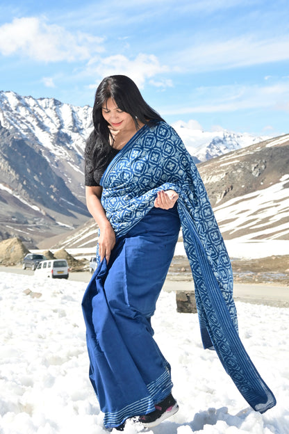 Model draping a Vasaka Jaipur Naina indigo cotton saree featuring traditional hand block prints