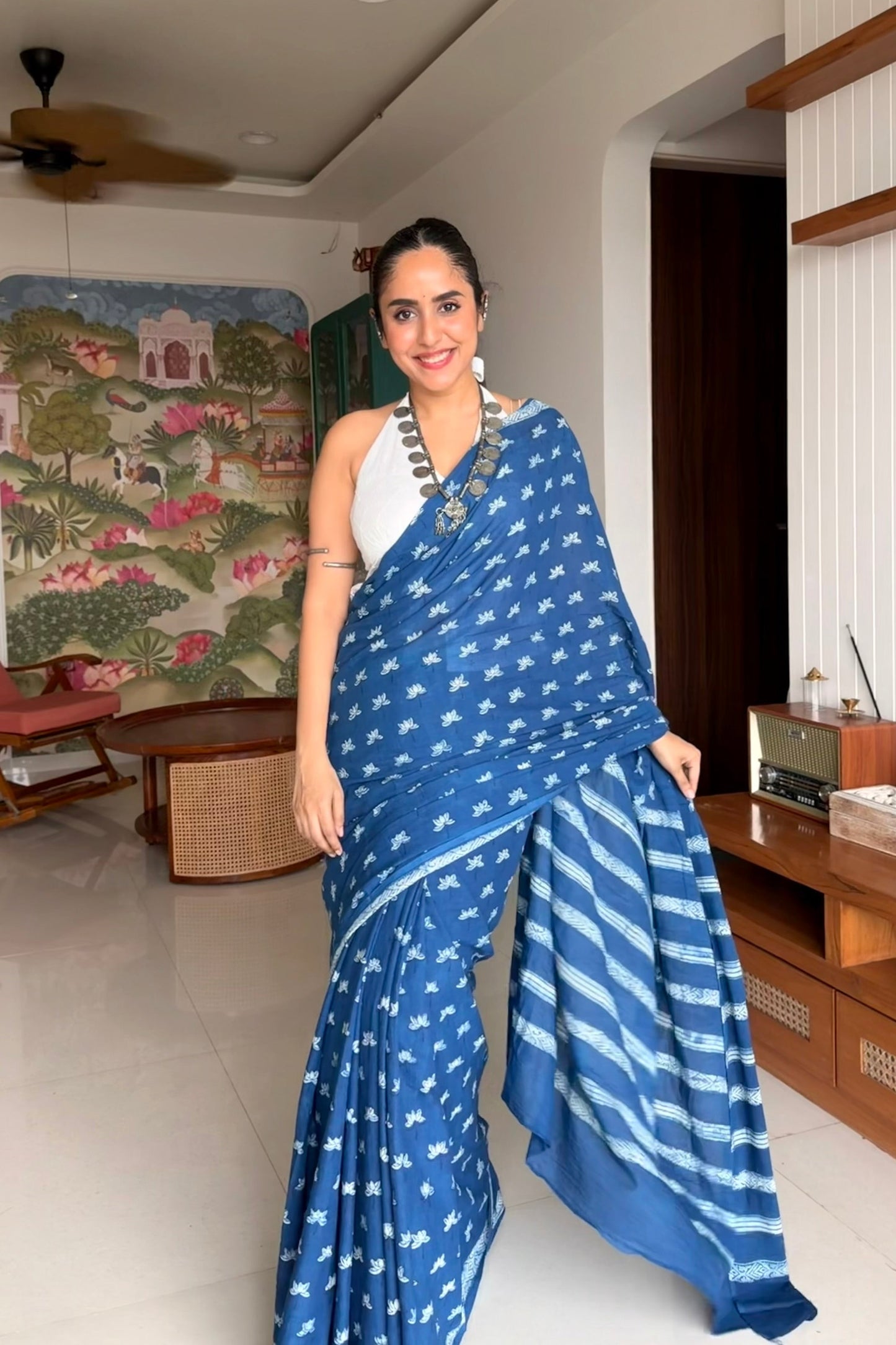 Professional indigo blue cotton Dabu print saree for smart formal wear.