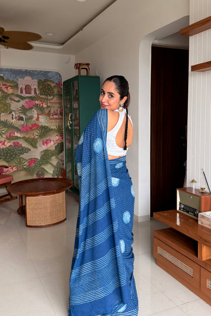 Indigo blue cotton saree with traditional white geometric block prints.